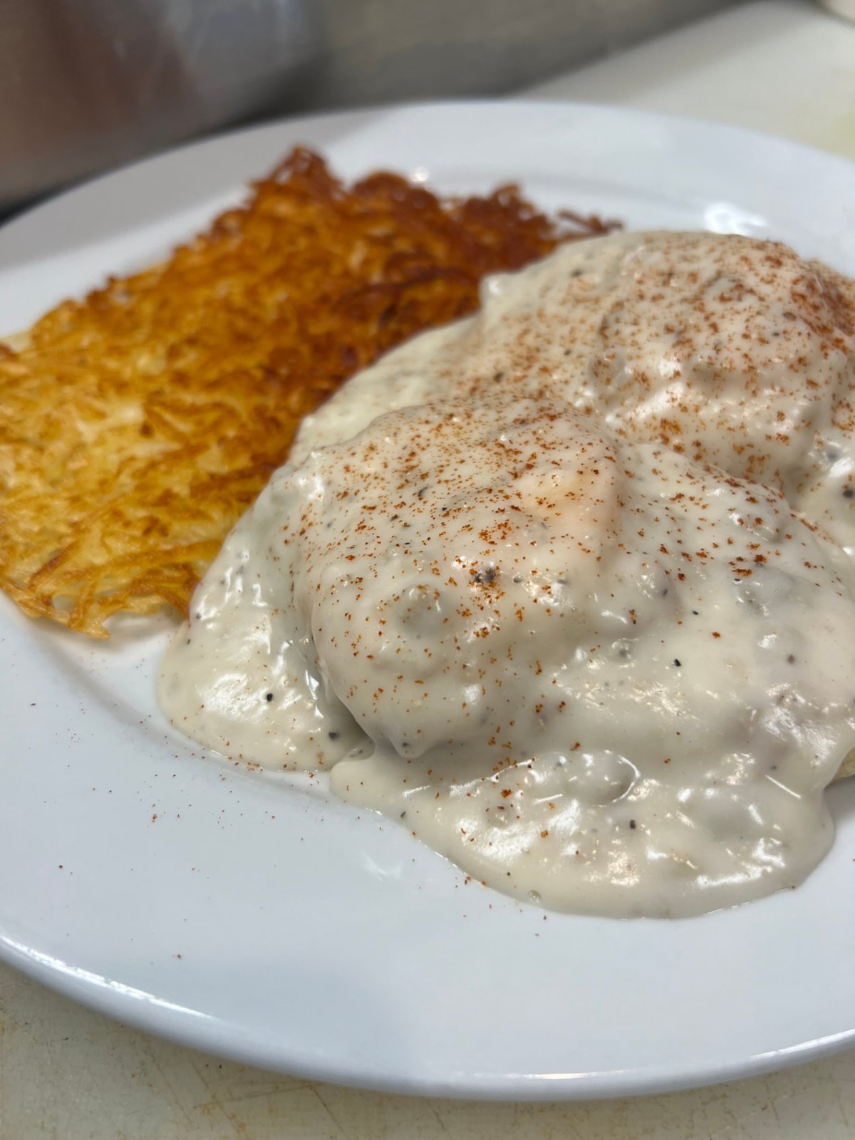 Biscuits smothered in sausage gravy