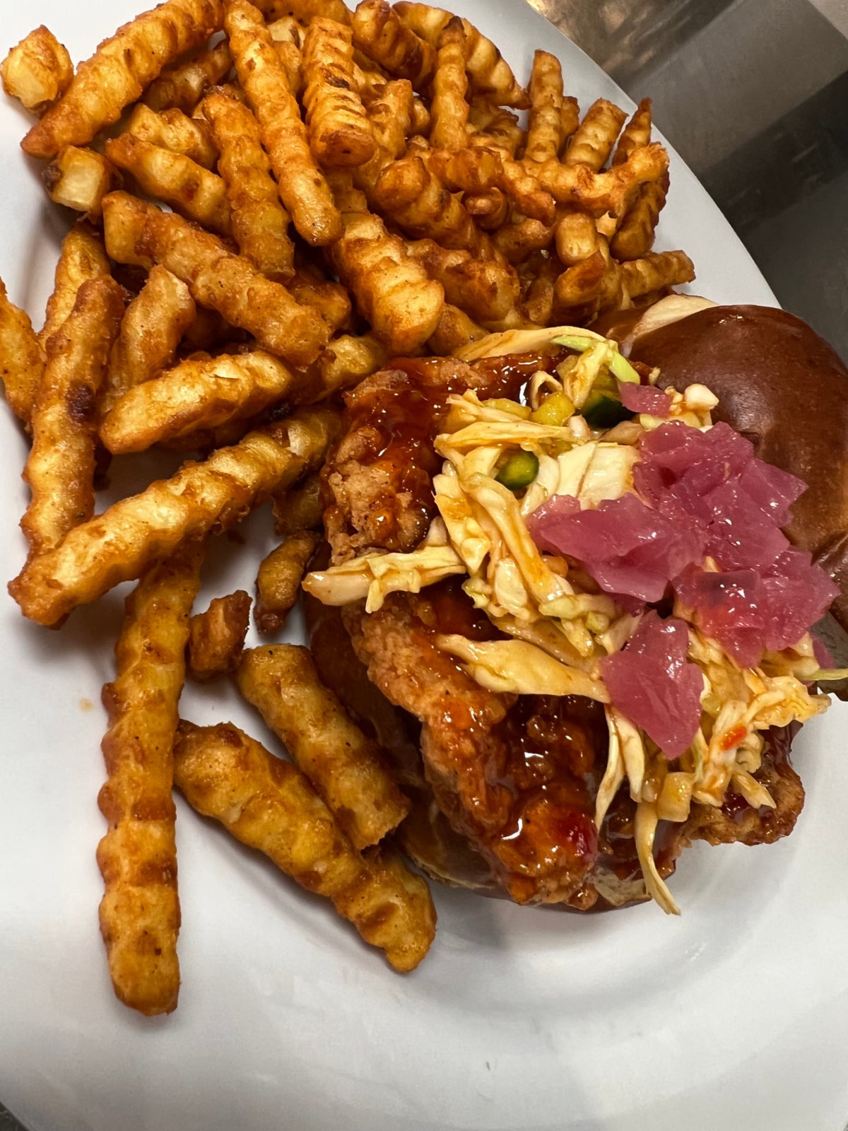 Korean BBQ chicken sandwich with cucumber slaw