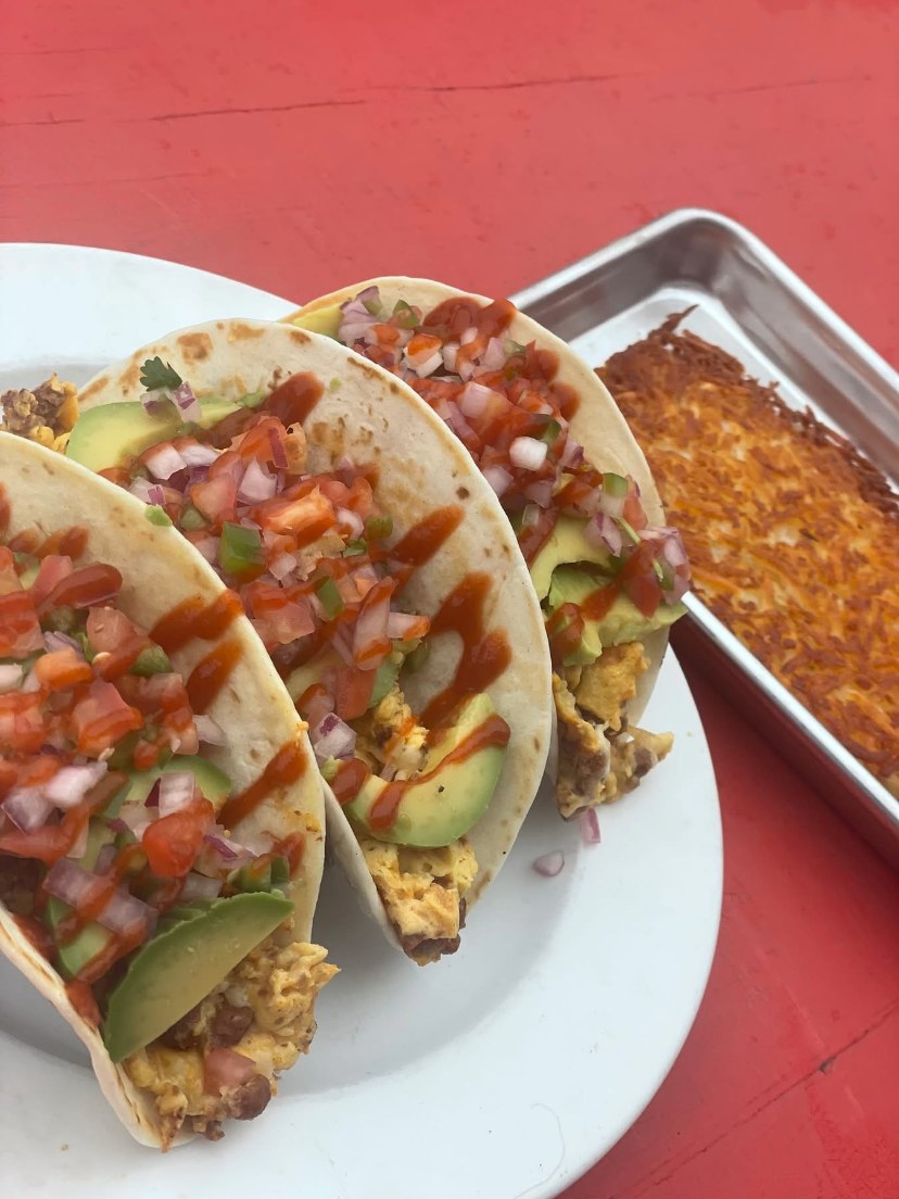Breakfast tacos with scrambled eggs, pico de gallo and avocado