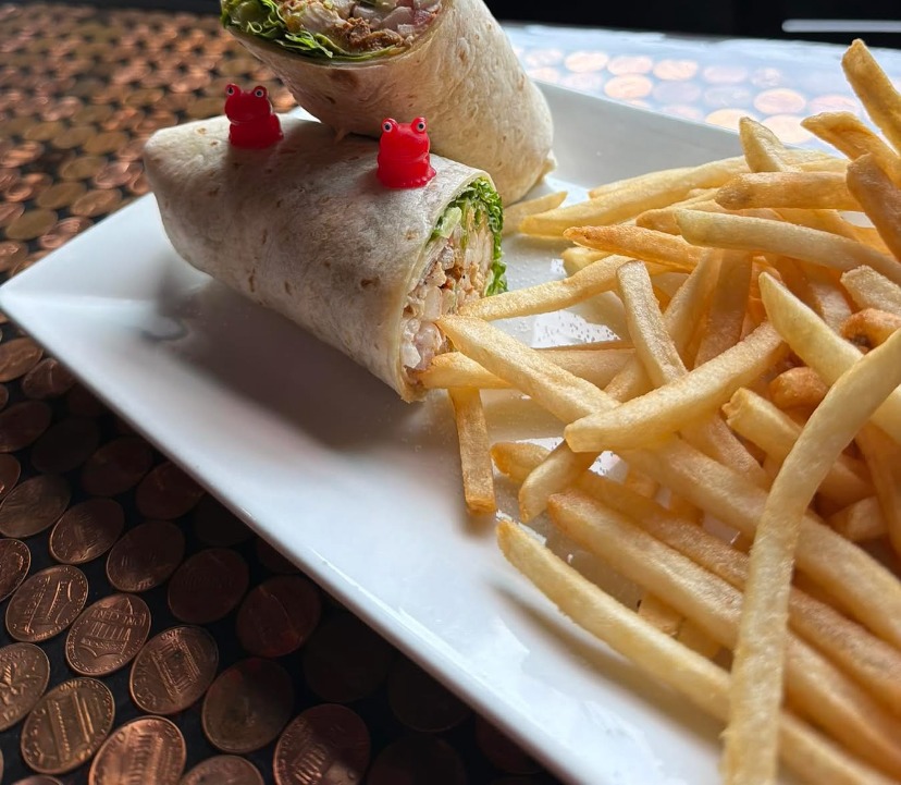 Wrap halves served with fries