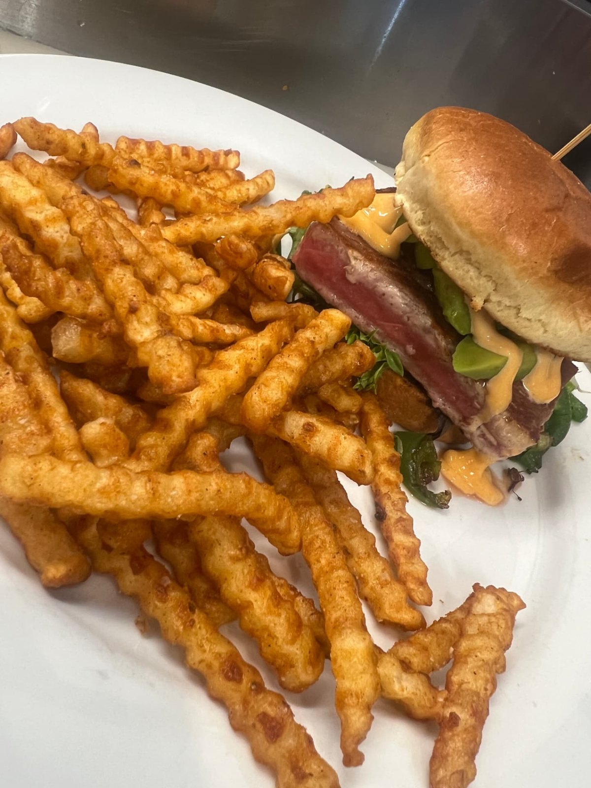 Seared Ahi tuna sandwich with avocado and spicy aioli