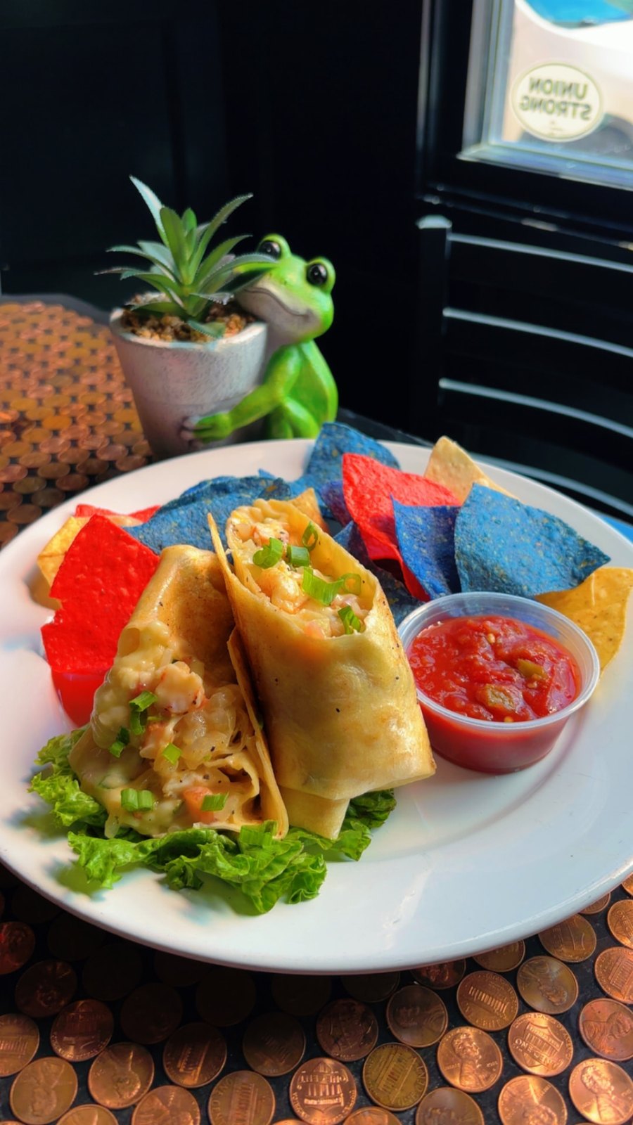 Rotating flavor egg rolls served with dipping sauce