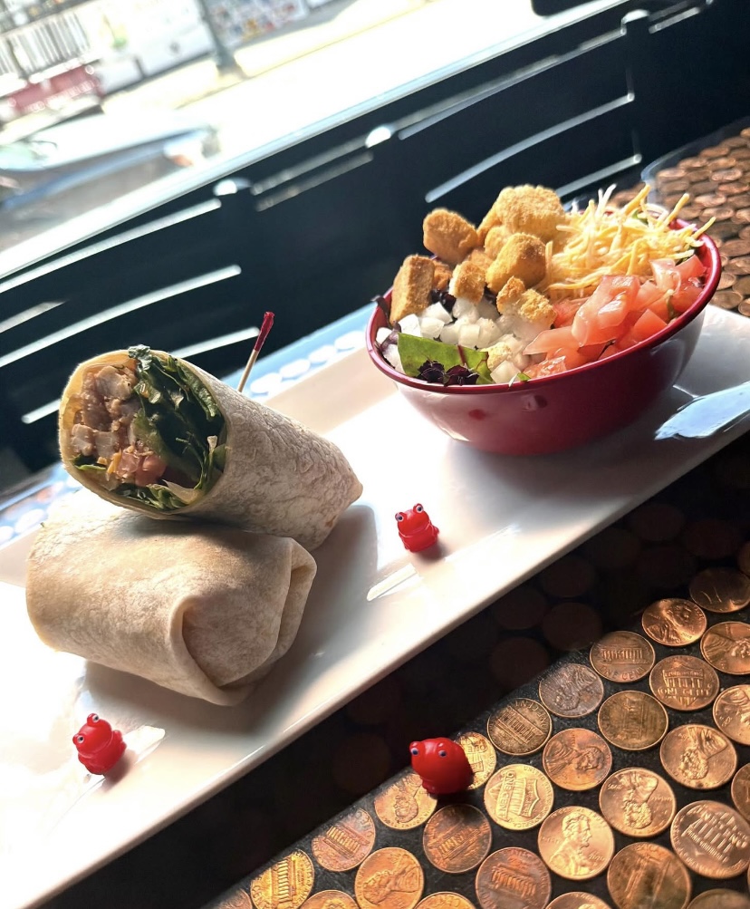 Wrap halves served with a side salad